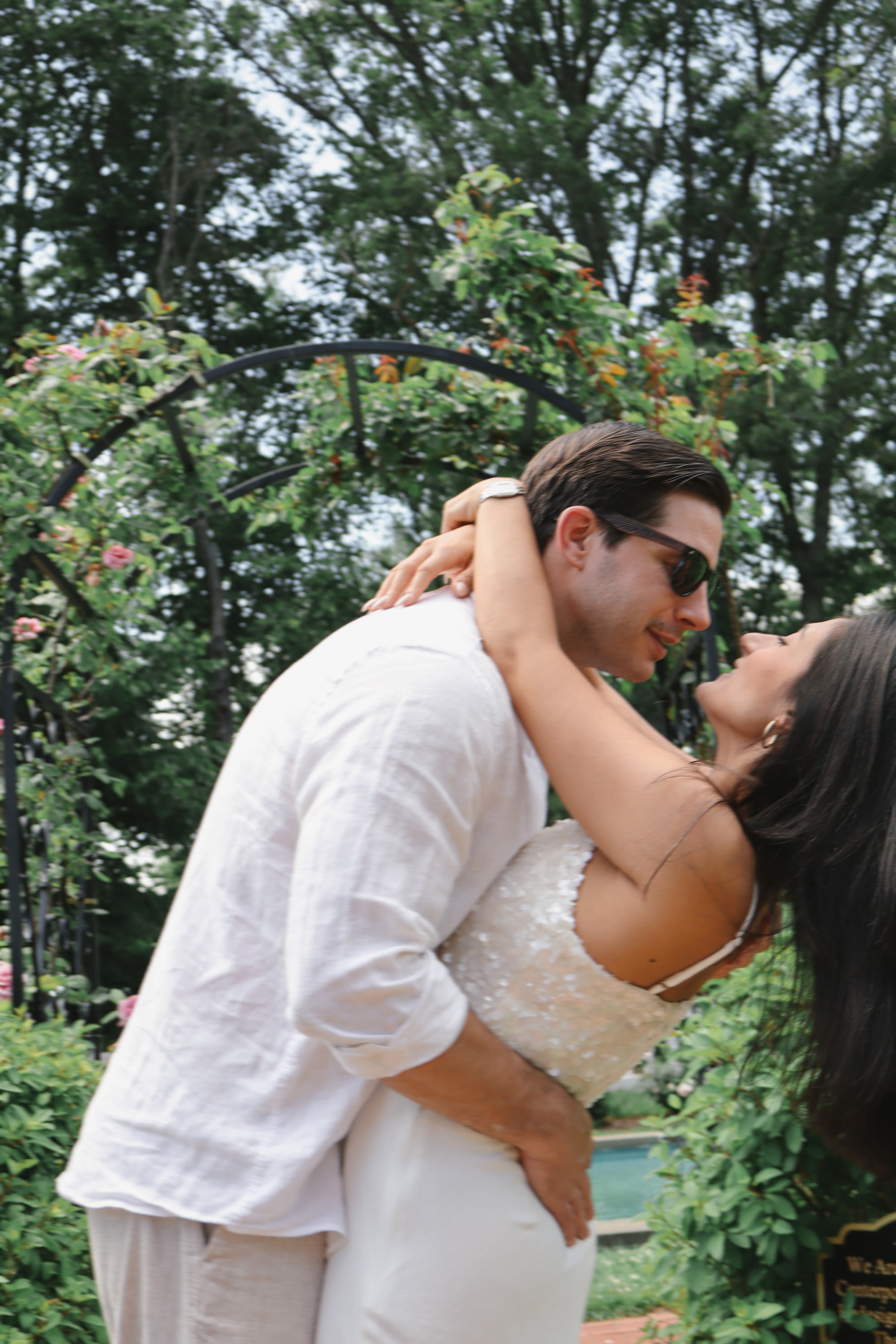 Couple embracing in garden