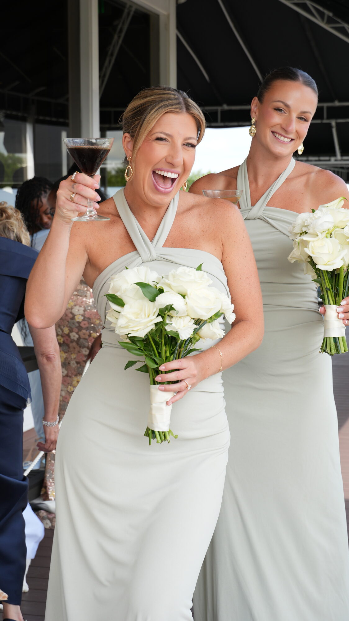 Bridesmaids toasting with cocktails